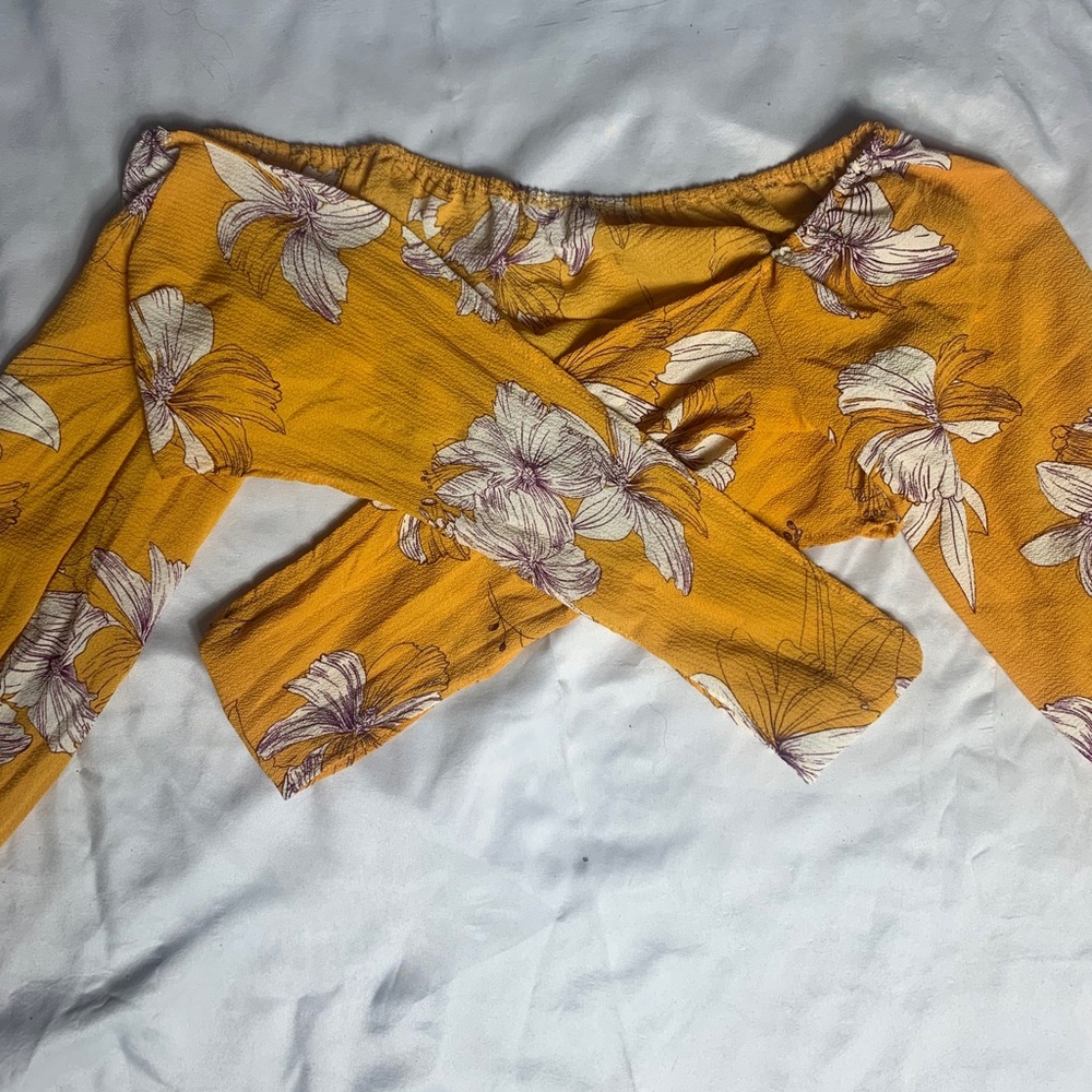 A yellow crop top.